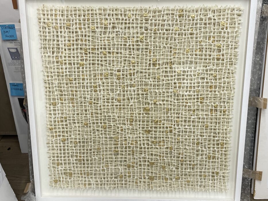 Interwoven III by paper make and artist Gill Wilson in painted wood frame